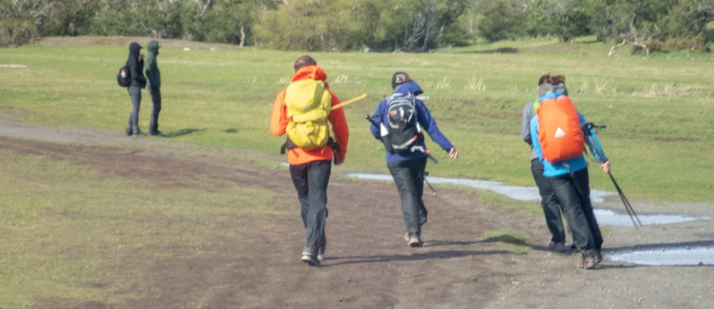 People walking in the wind